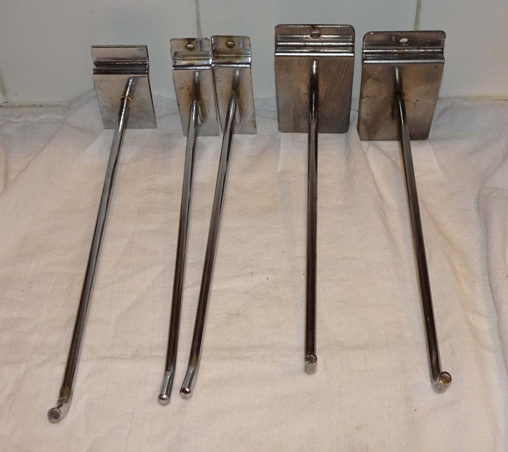 25 Used Assorted Chrome Slat wall Hangers Hooks Holder Hat Brackets Hardware