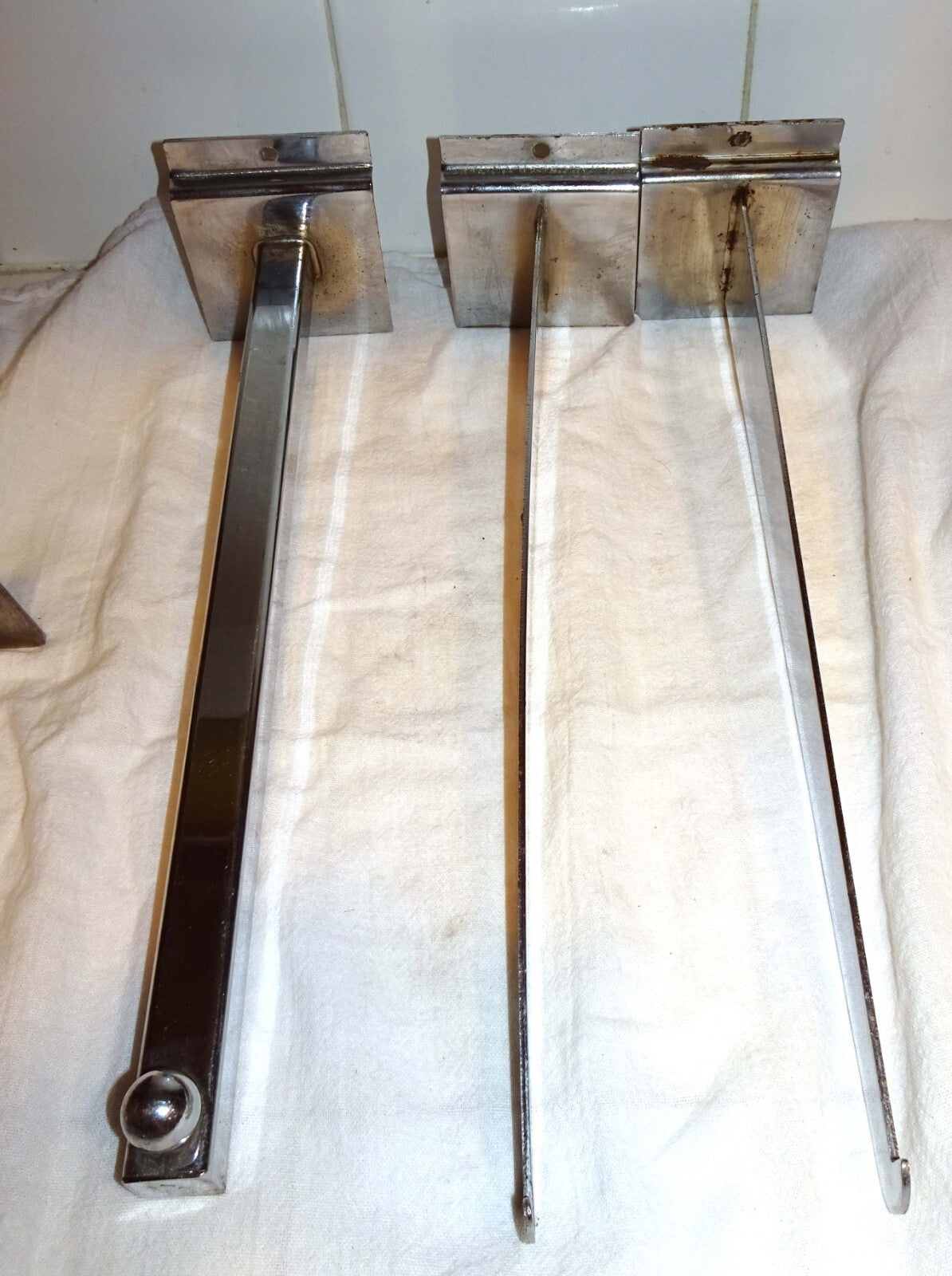 25 Used Assorted Chrome Slat wall Hangers Hooks Holder Hat Brackets Hardware